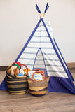Large and Medium U Shopper Baskets with toys in front of childs play tent